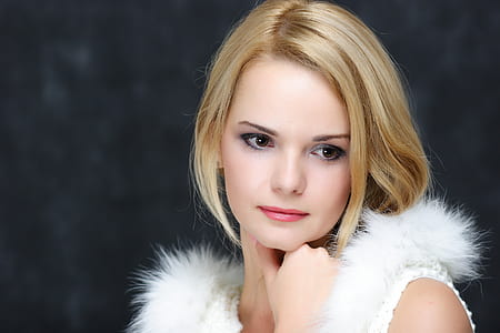 photo of woman wearing white sleeveless top thumbnail