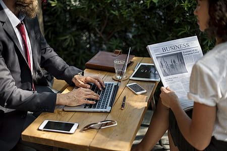 person holding gray laptop thumbnail