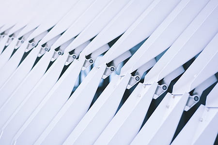 close-up photography of white interlocking metal parts thumbnail
