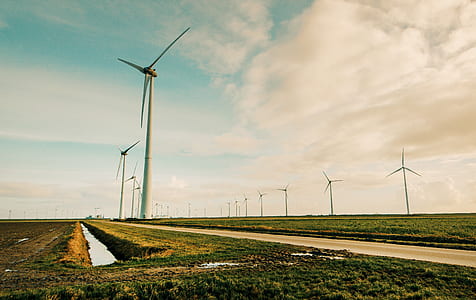 Windmill Energy on Green Grass Field thumbnail