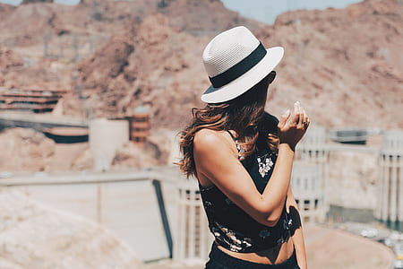 woman in black sleeveless top standing at daytime thumbnail