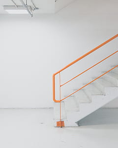 staircase with orange handrail thumbnail