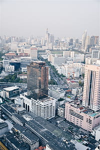 aerial view of city under gray sky during dyatime thumbnail