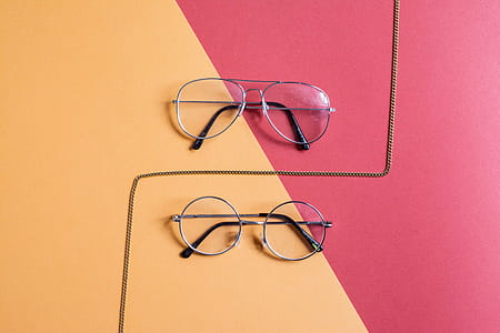 Two Clear Eyeglasses With Gray Frames thumbnail