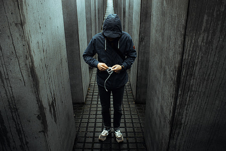 person wearing black hoodie thumbnail