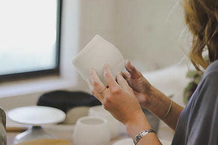 woman holding paper thumbnail