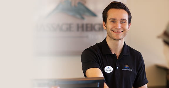 smiling man in black polo shirt thumbnail