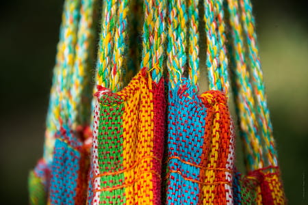 close-up photo of multicolored knitted textile thumbnail