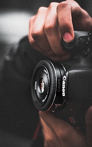 black Canon DSLR EOS Rebel camera thumbnail