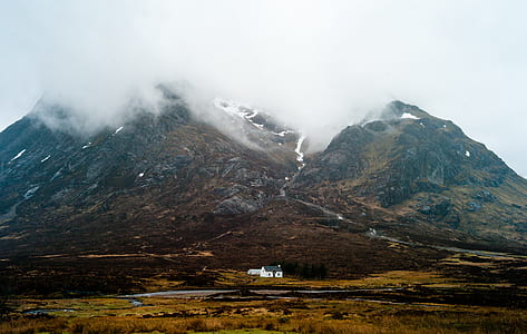 mountains covered with white clouds at daytime thumbnail