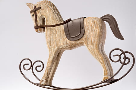 brown and gray wooden rocking horse thumbnail