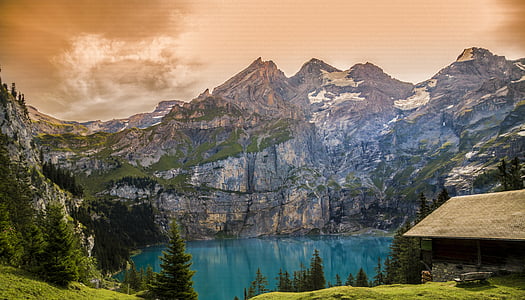 body of water and mountains thumbnail