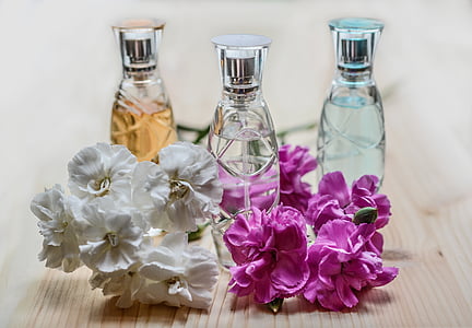 three assorted-scent fragrance bottles thumbnail
