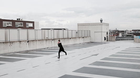 man running on rooftop thumbnail
