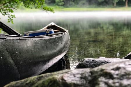 shallow focus photography of gray rowboat thumbnail
