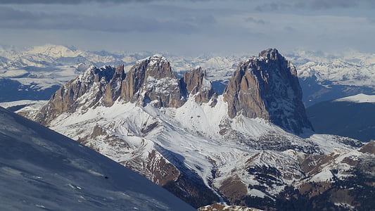 gray rock formation covered with snow thumbnail