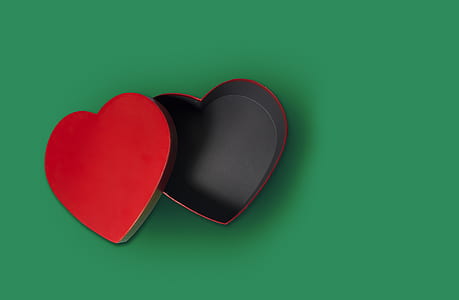 red heart chocolate case on green surface thumbnail