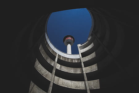 low-angle photo of grey architectural building thumbnail