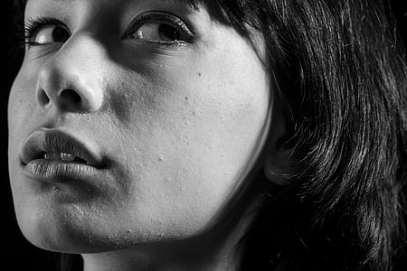 grayscale photograph of woman's face portrait thumbnail