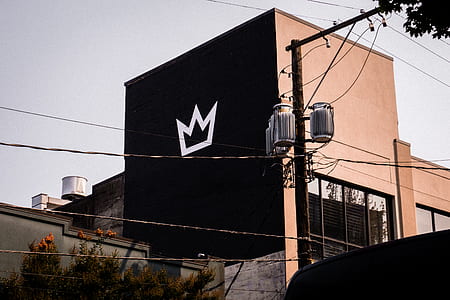 power line outside building with crown printed on wall thumbnail