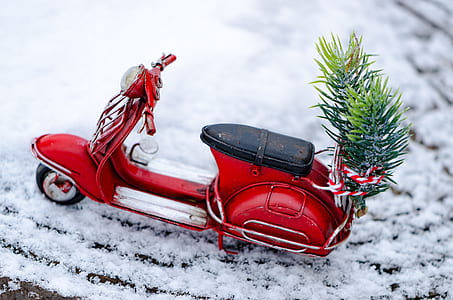 red motor scooter on snow thumbnail