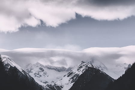 Photography of Mountains Covered With Snow thumbnail