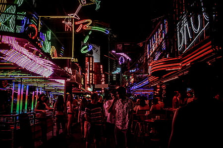 silhouette photography of alley with people thumbnail
