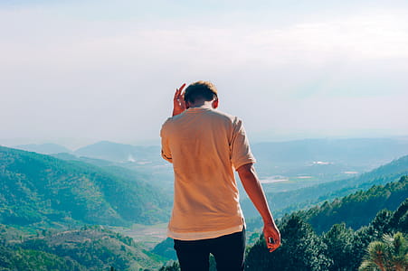 Person Wearing Brown Shirt thumbnail