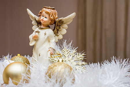 angel figurine near baubles thumbnail