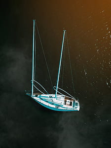 white boat on body of water during daytime thumbnail