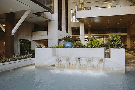white building with pool thumbnail