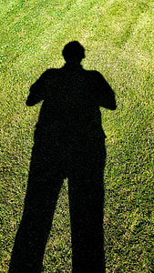 silhouette of man on grass thumbnail
