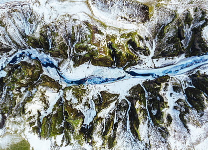 aerial view of mountain with river thumbnail