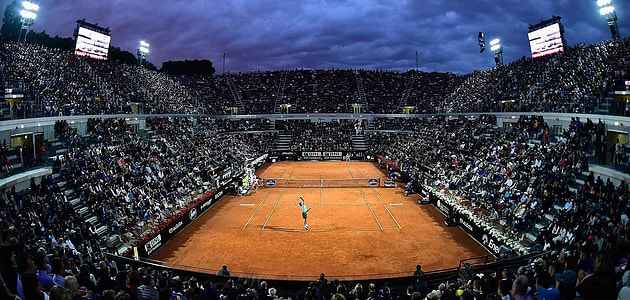 people inside tennis stadium thumbnail