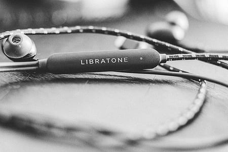 gray scale photo of Libratone earbuds thumbnail