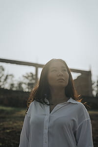 woman staring at left side outdoors thumbnail
