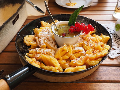 cooked dish served on black cooking pan thumbnail