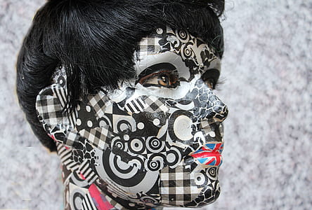 person with face paint thumbnail