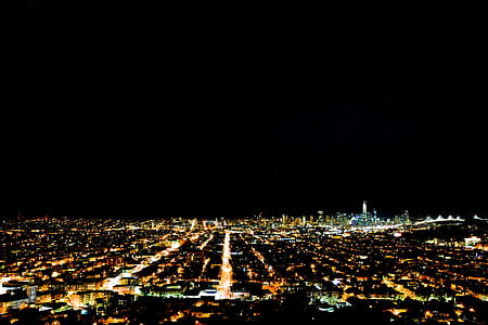 aerial photo of cityscape at night thumbnail