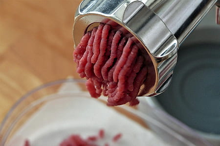 meat in gray metal grinder thumbnail