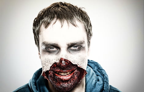man with makeup wears blue hoodie thumbnail