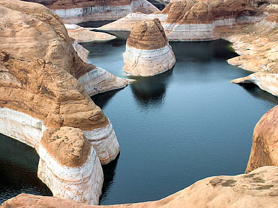 photo of canyon with body of water thumbnail