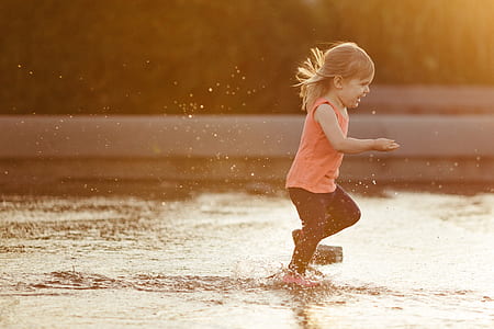 girl playing on water thumbnail