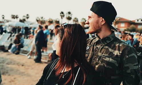 man beside woman thumbnail