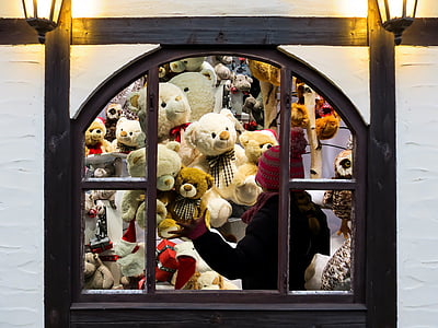 person standing beside window thumbnail