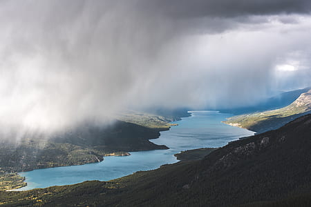 body of water between mountain thumbnail