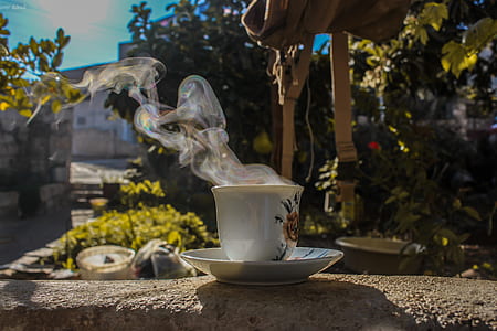 Close-Up Photo of Ceramic Cup With Saucer thumbnail