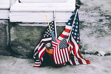 USA flags beside concrete surface thumbnail