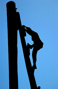 man climbing post thumbnail