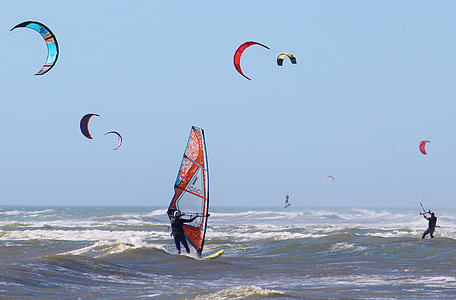man parasailing on sea thumbnail